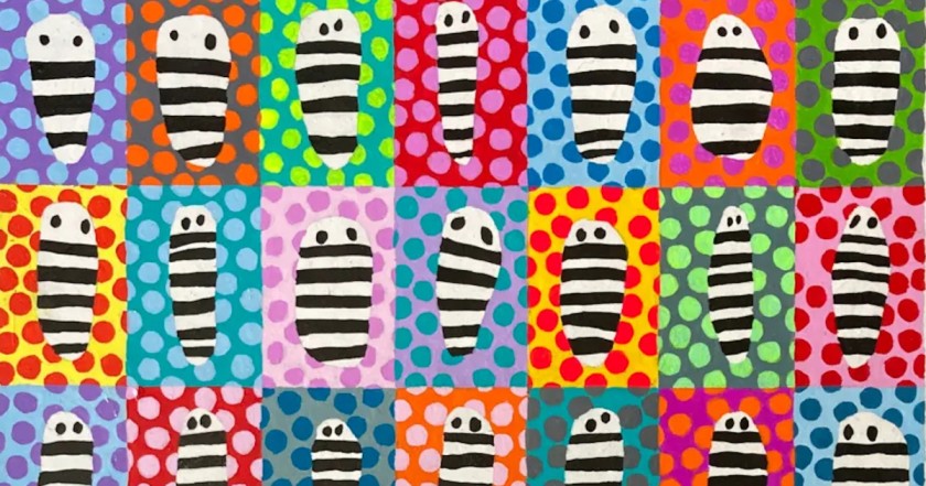 A pattern of colorful black-and-white striped creatures on polka dots