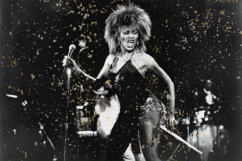 Tina Turner performing on stage, surrounded by confetti