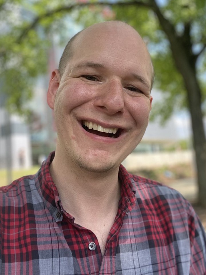 Photo of John Watt, a smiling white man