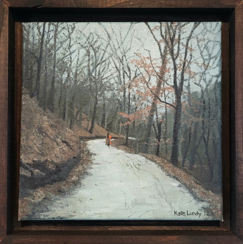 A painting in a recycled wood frame, depicting white-grey skies and paths in Schenley park, the path lined with twiggy trees and brown earth, with a figure wearing a red scarf.