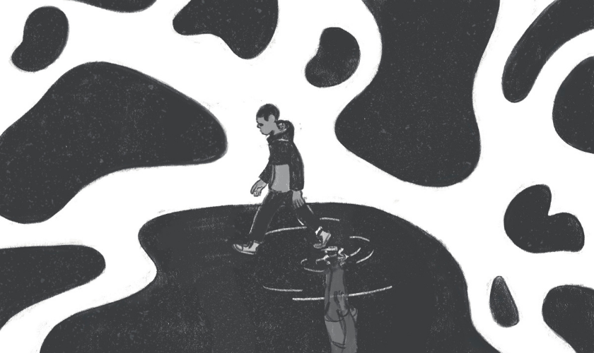 A person walks across a dark puddle, casting a reflection amid abstract shapes.