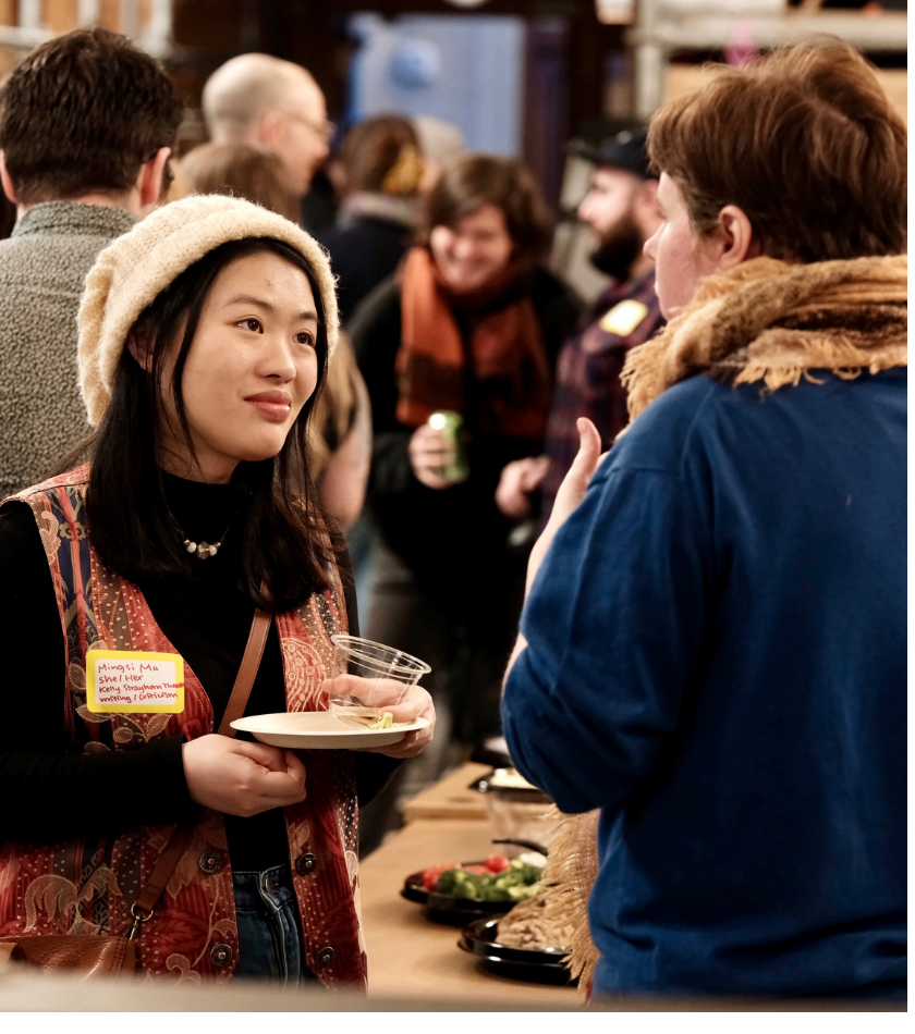 People connect in a crowded room