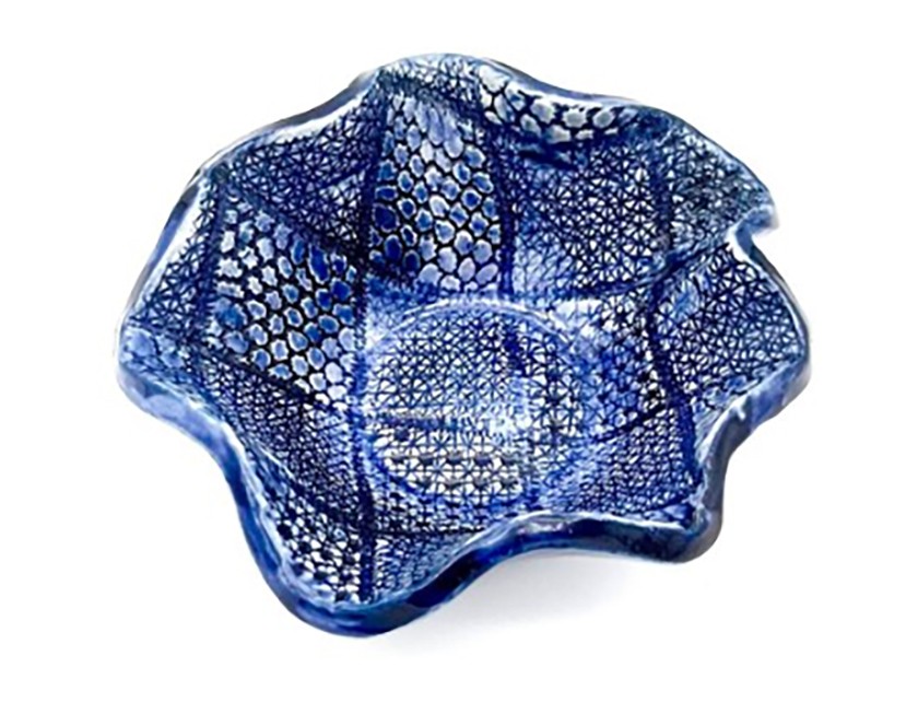 Bright blue patterned ceramic bowl