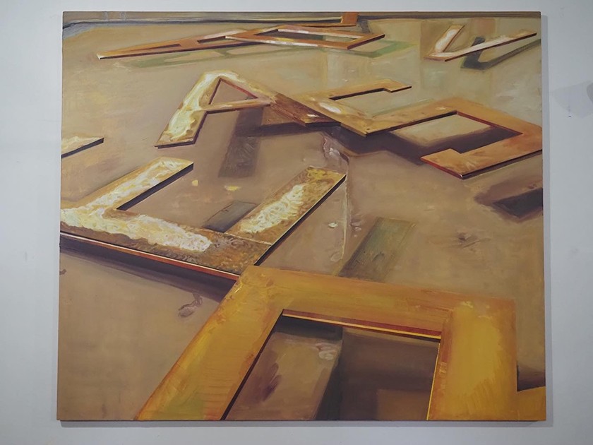 A painting of large rusted scattered metal letters