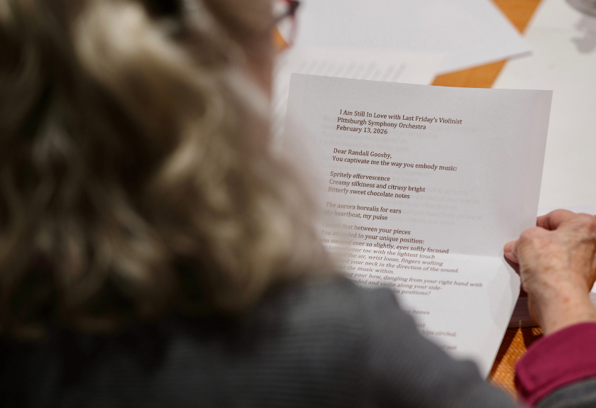 A person holds a letter addressed to violinist Randall Goosby 
