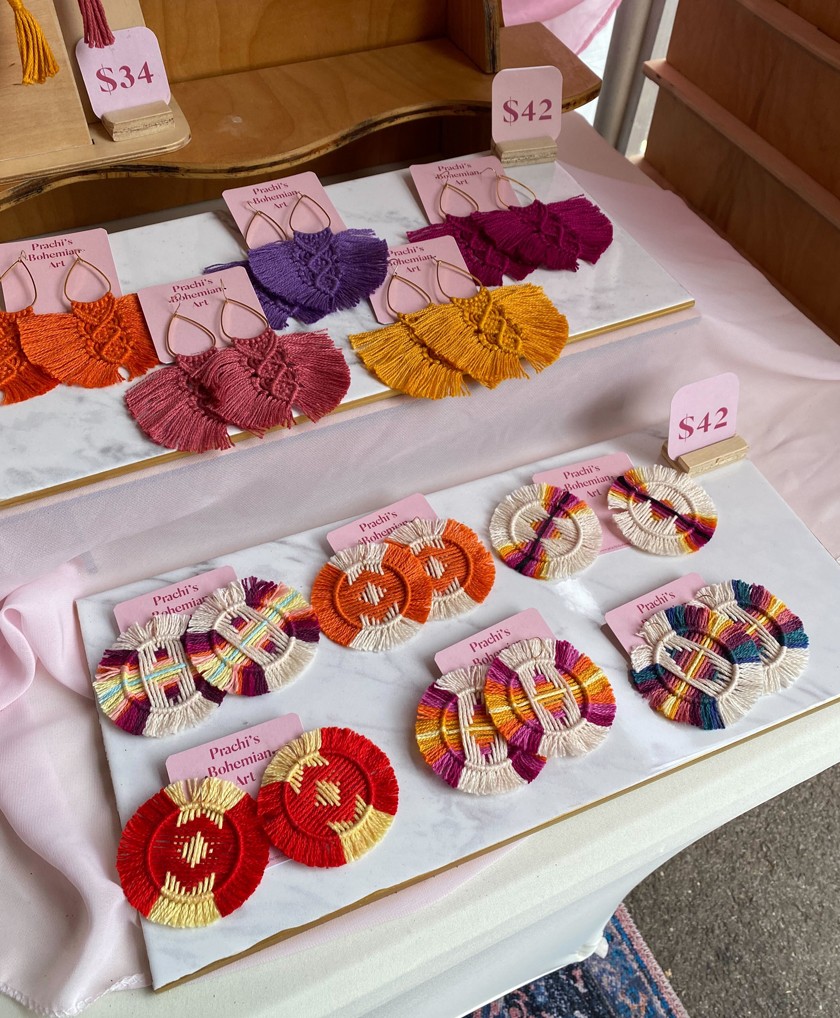 A display of colorful handmade earrings