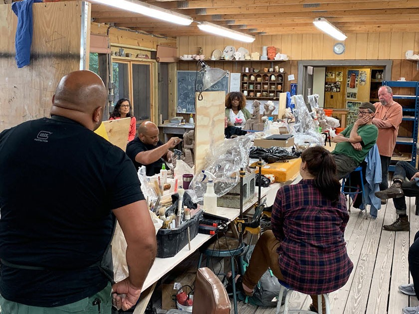 Kyle and Kelly Phelps giving a demonstration in the Touchstone Ceramics Studio